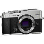 OM SYSTEM PEN zilver + 14-42mm III