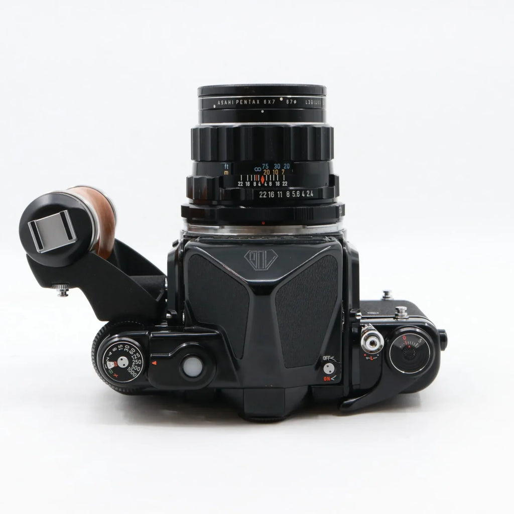 Pentax 6x7 body + SMC Takumar 105mm f/2.4 + handle tweedehands